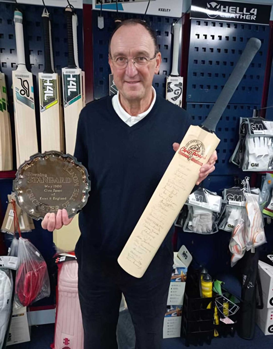 Chris Tavare in the Kent Cricket shop with a multi-signed cricket bat commemorating his 1988 Benefit Season plus an Evening Standard plate for Cricketer of the Month for May 1980.