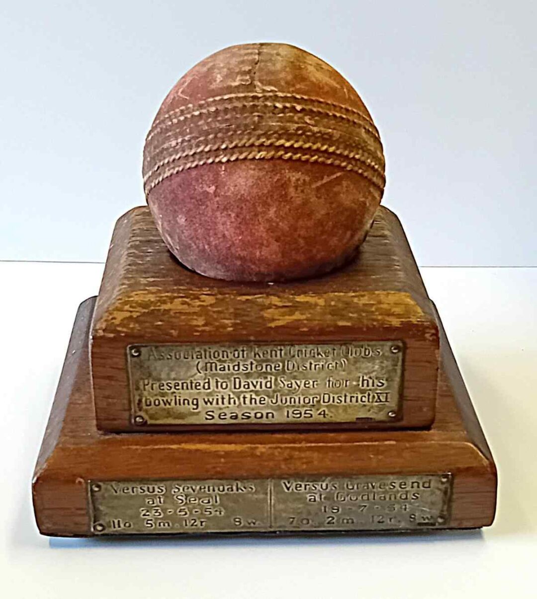 Ball presented to David Sayer for outstanding bowling in district cricket in 1954